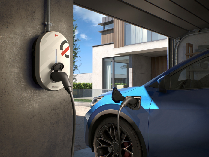 mobilize powerbox charger plugger into blue renault in garage